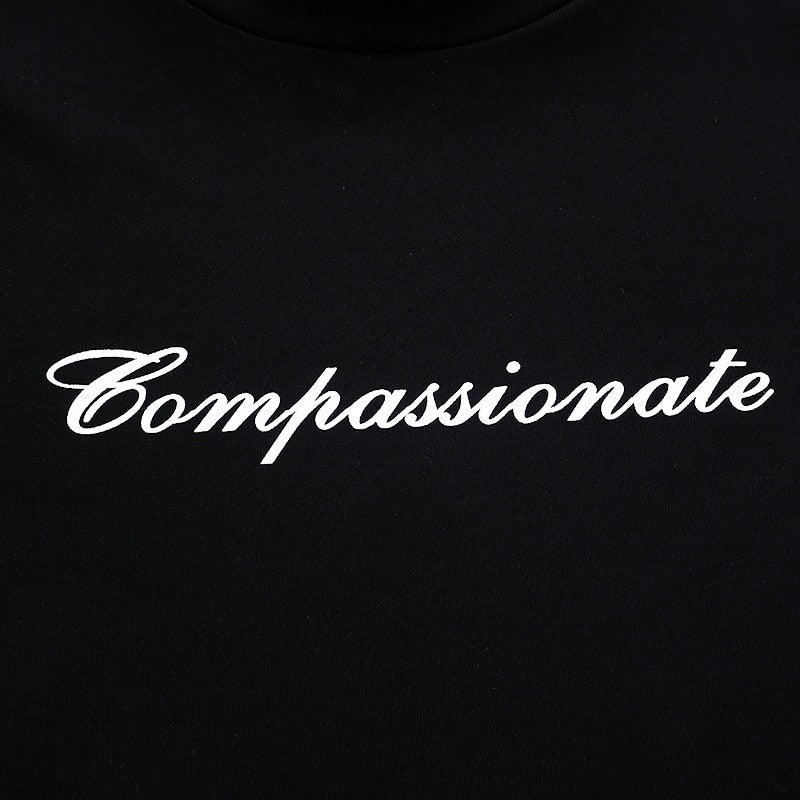 Compassionate Short Sleeve Graphic Top